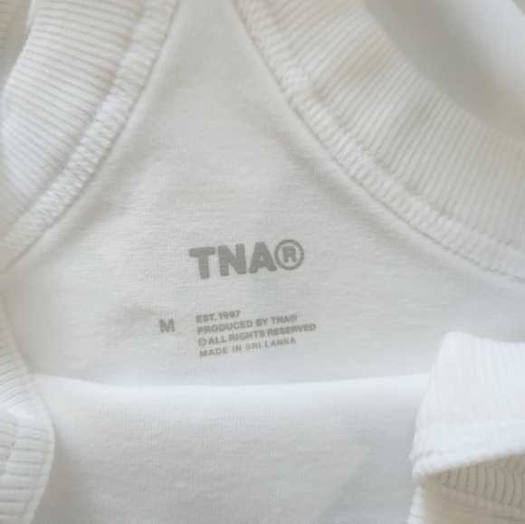 Brand new with tag Aritzia TNA size medium top. - Picture 4 of 9